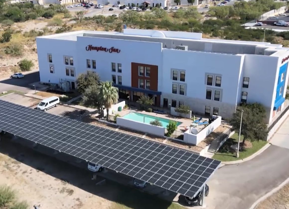 Hampton Inn in Eagle Pass, Texas — solar carport and hotel sign